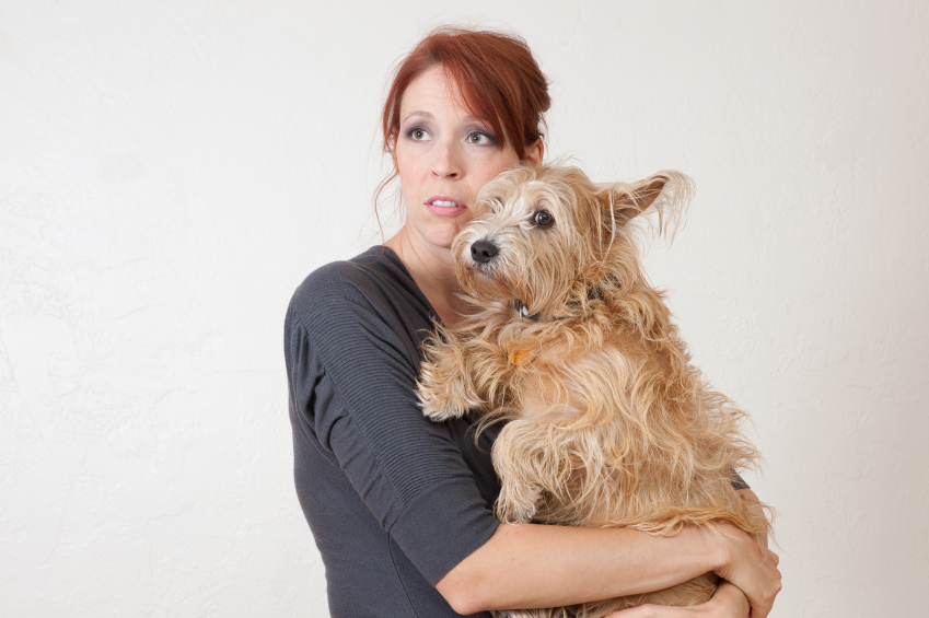 Anxious woman with dog iStock_000018303283_Small